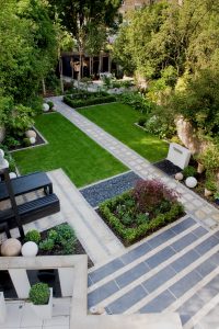 photograph of a pathway in a modern garden by earth designs garden design