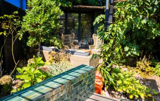 Metro-style tiled green garden wall